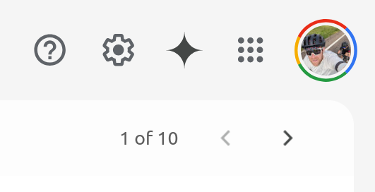 A screenshot of the upper-right corner of Gmail with the Gemini logo inline with help, settings, and the menu